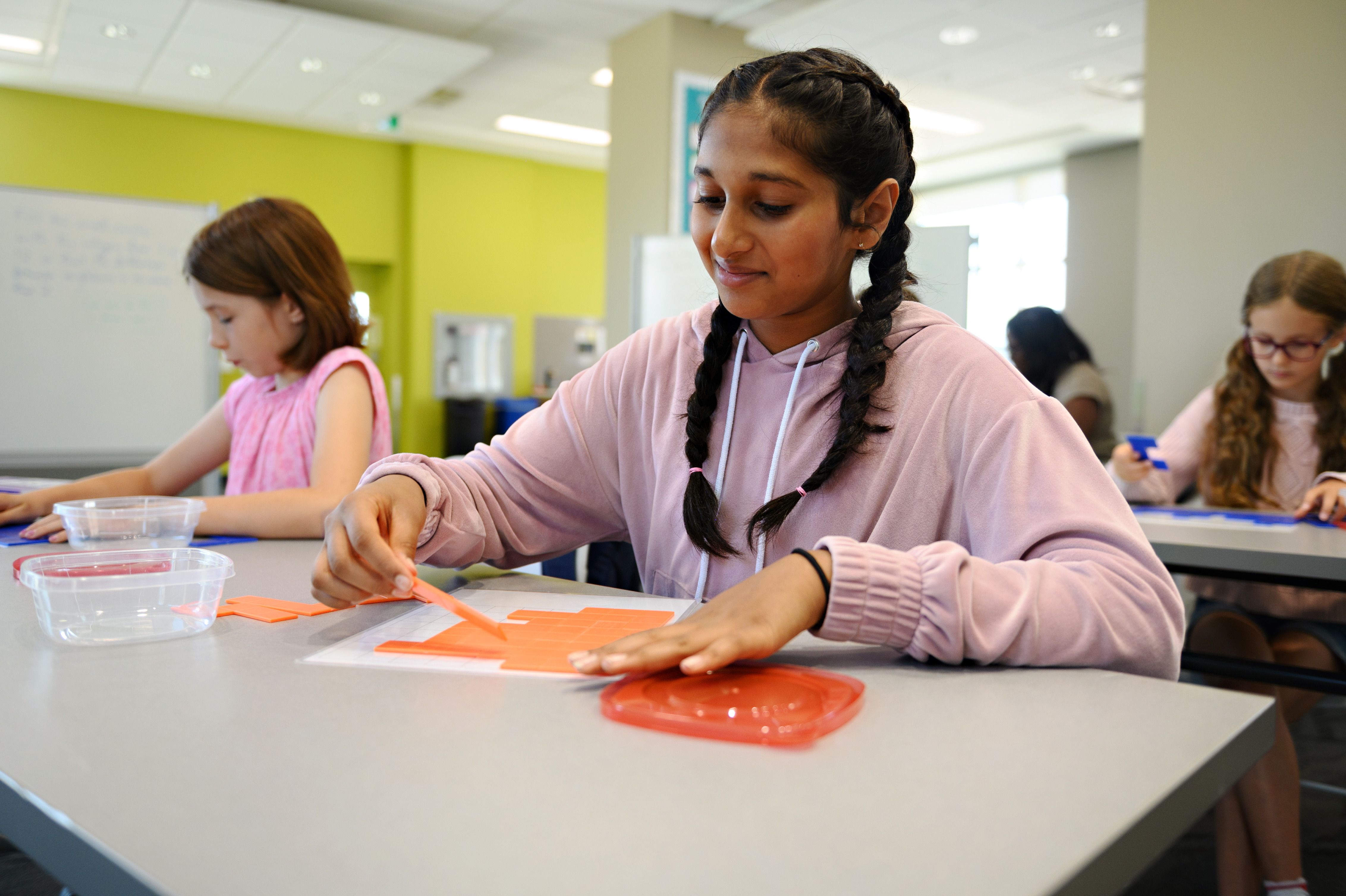 Student interacting with math material