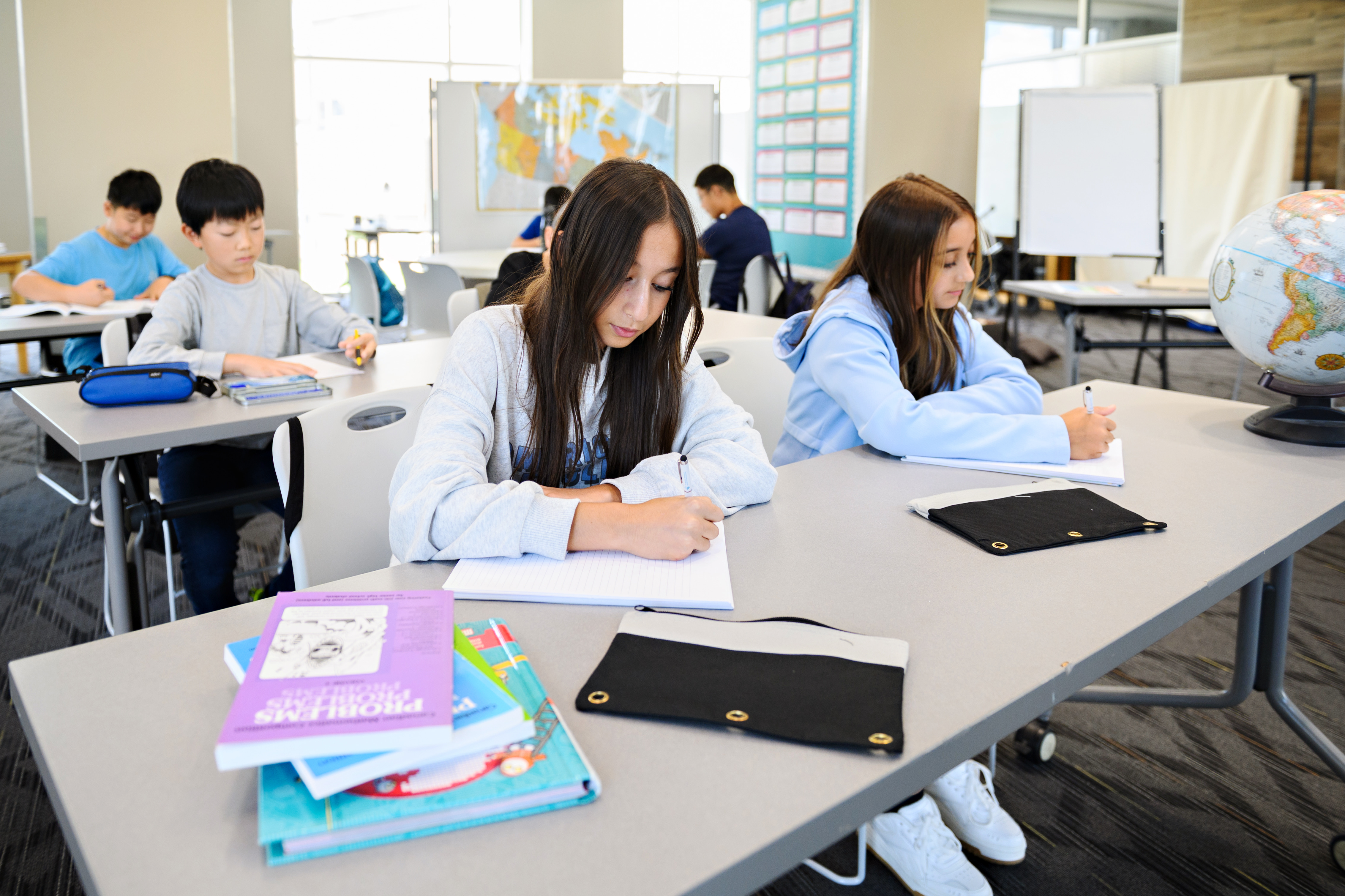 Students writing CEMC contests in a classroom