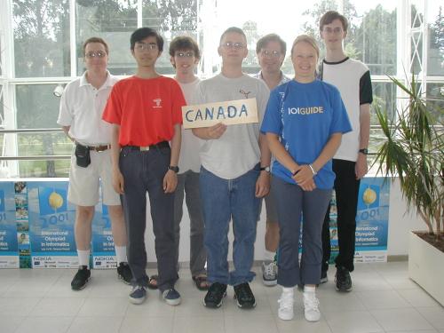 IOI 2001 team from Canada - Barry Ferguson, David Zhang, William Slofstra, Marcin Mika, Gordon Cormack, IOI Guide, and Thomas Ootjers