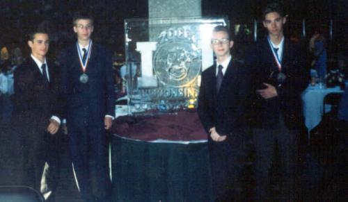 IOI 2003 team from Canada: Geoff Lywood, Matei Zaharia, Sean Henderson, and Simon Parent