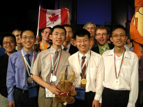 IOI 2009 team from Canada - (From left to right): Front row: Terry Bae, Peter Wen, Robin Cheng, Hanson Wang, Brian Bi Back row: Graeme Kemkes, Ivan (IOI Guide), Richard Peng, Ian Munro, and Troy Vasiga