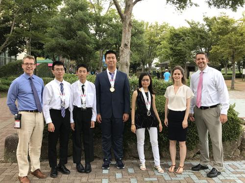 IOI 2018 team from Canada -  Troy Vasiga, Victor Rong, Zixiang Zhou, Joey Yu, Ava Pun, Carrie Knoll, and J.P. Pretti