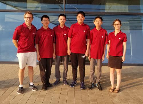 IOI 2019 team from Canada - from left to right: Troy Vasiga, Victor Rong, George Chen, Kevin Wan, Zixiang Zhou, and Carrie Knoll