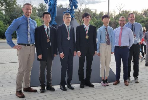 IOI 2023 team from Canada. From left to right: Paul McGrath, Mars Xiang, Balint Rozsa, Ryan Bai, Warren Bei, Troy Vasiga, J.P. Pretti