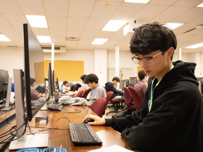 Students attempting CEMC contests in a computer lab